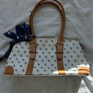 Dooney & Bourke Signature white and brown leather domed satchel handbag.